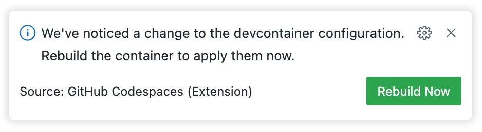 Screenshot of the message: "We've noticed a change to the dev container configuration." Below this is the "Rebuild Now" button.